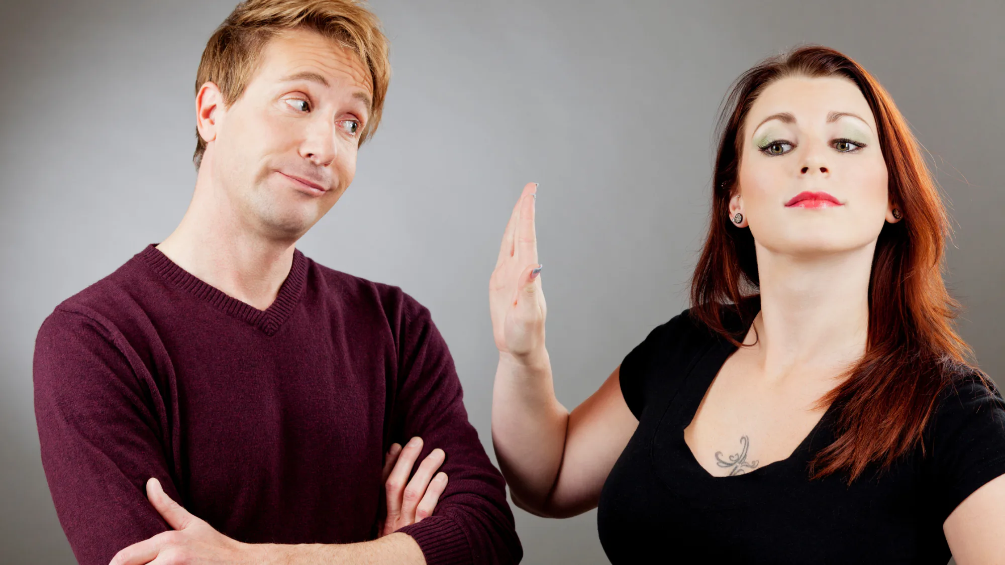 Couple in visible disagreement, illustrating relationship conflict, communication problems, and the need for repair in marriage