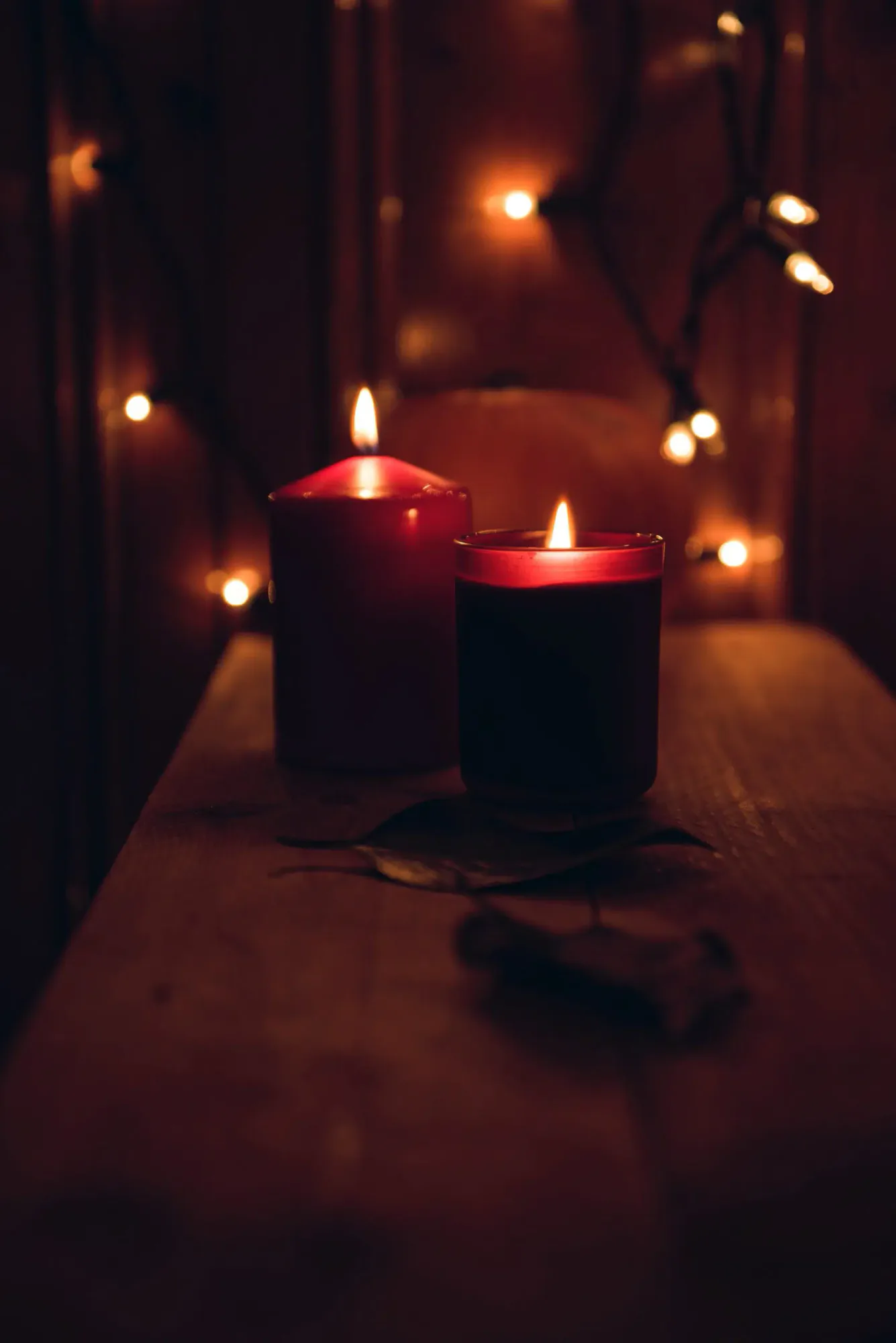 Soft candlelight in a dark room symbolizing warmth, intimacy, reflection, and the emotional atmosphere of lasting love.